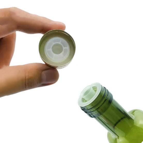 ROPP aluminum cap showing EPE liner and Bridge-Break tamper-evident mechanism