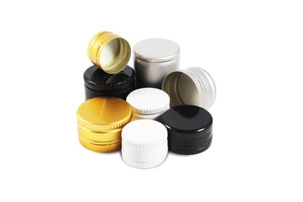 Assorted ROPP aluminum closures in gold, silver, black, and white finishes